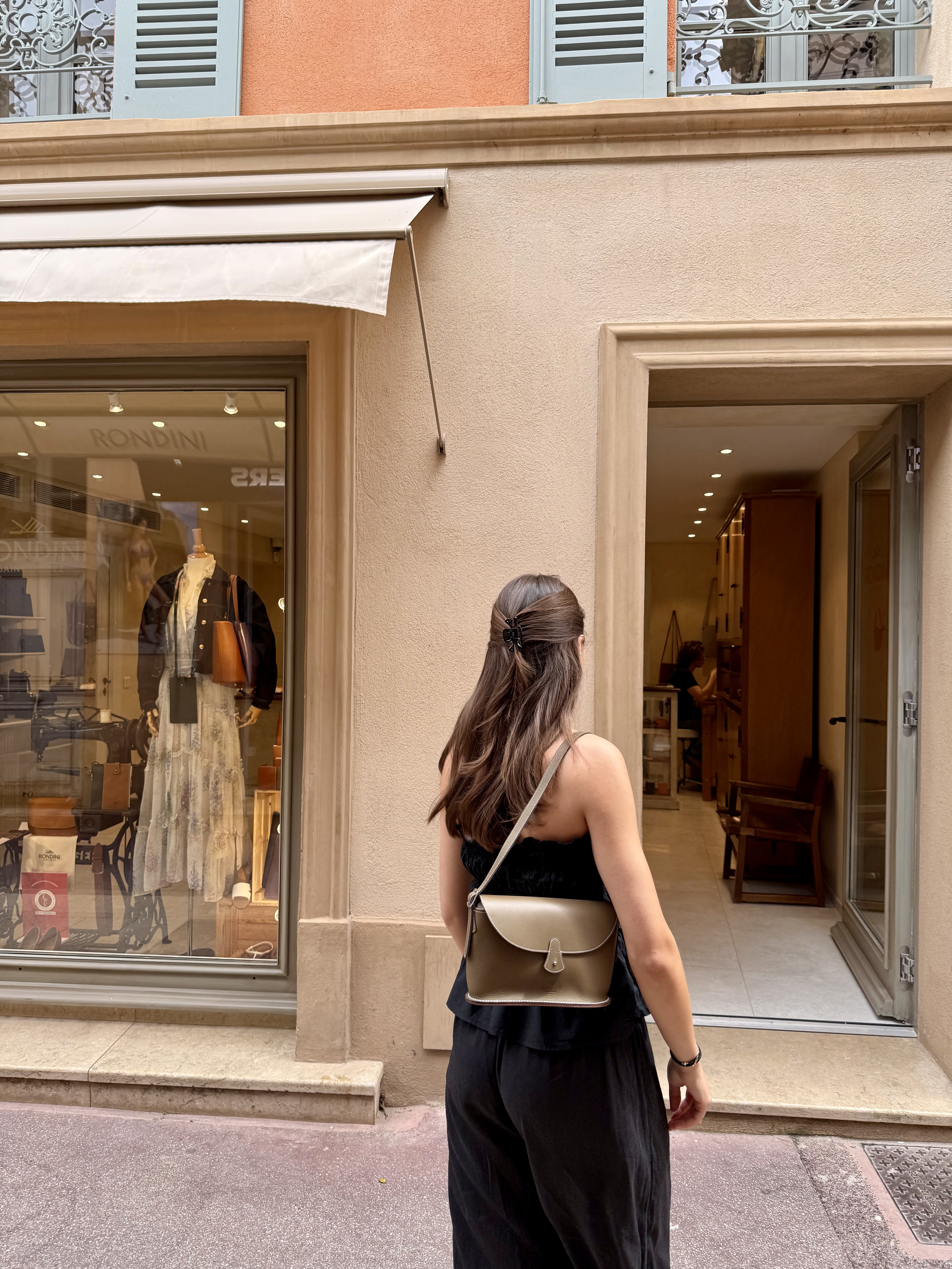 pauline entering new boutique